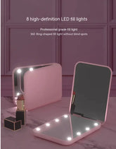 GlowFold LED Makeup Mirror – Pink color with LED lights on