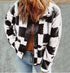 women's plaid jacket black and white close-up detail
